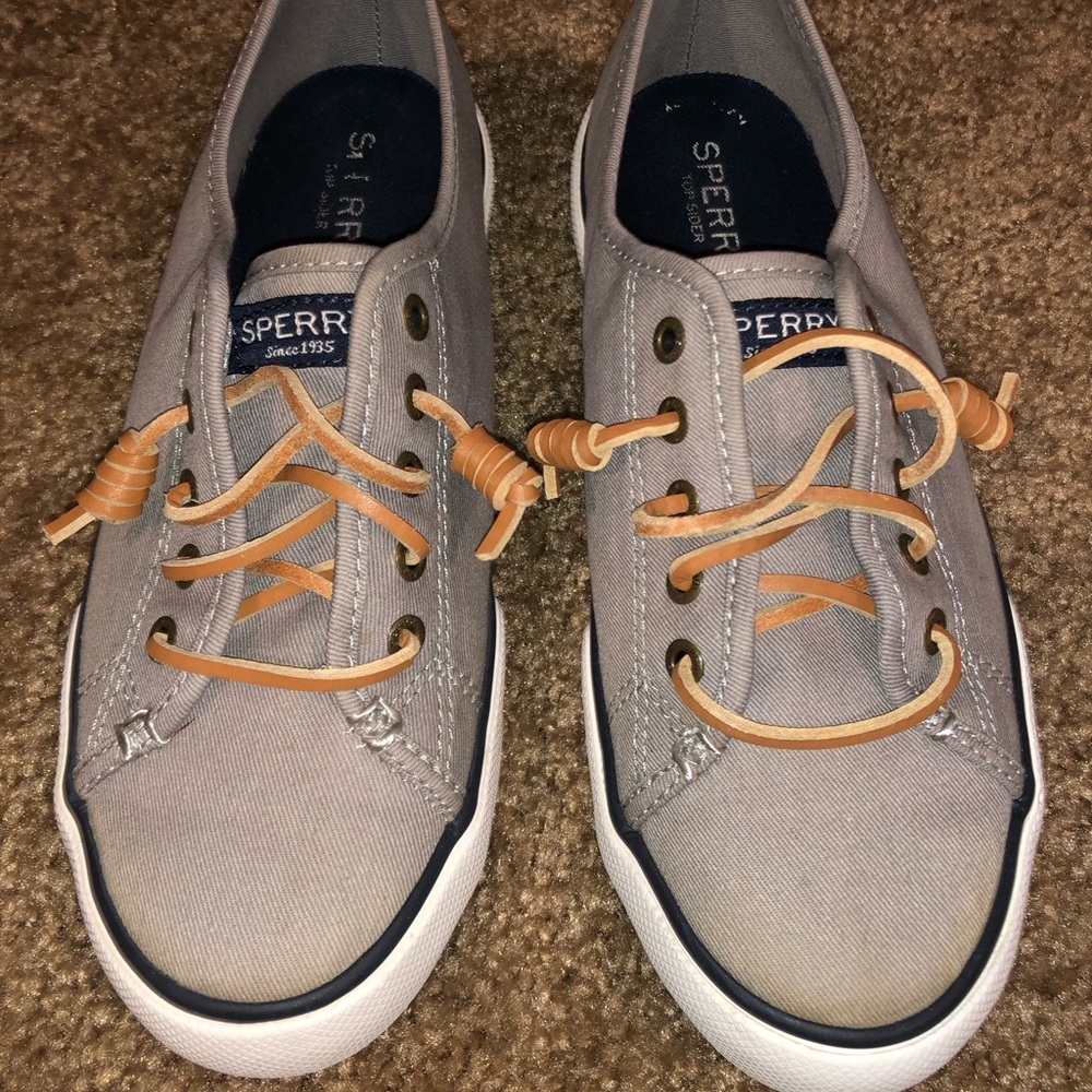 Sperry Boat Shoes. Gray coloring with blue insoles and cognac color laces.